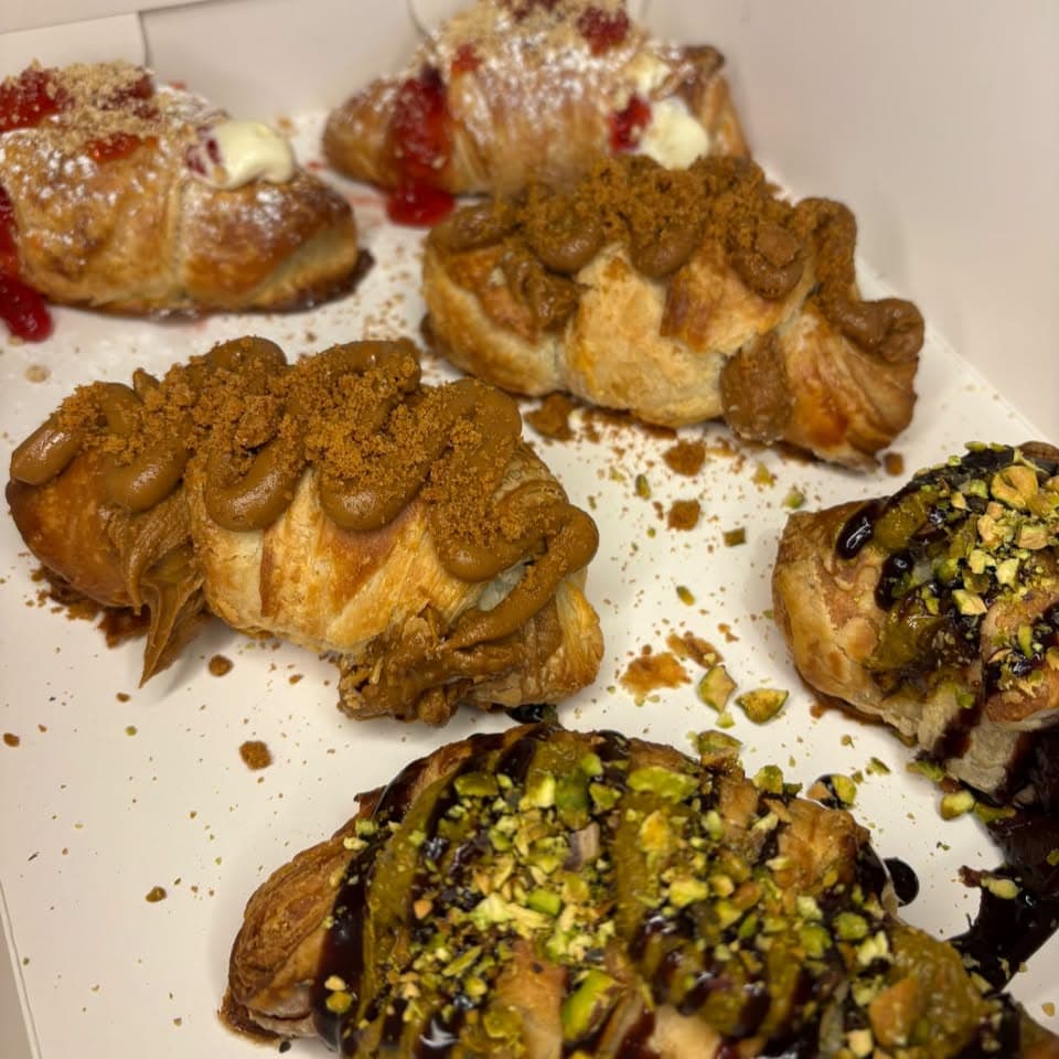 Boxed gourmet treats ready for customer pickup